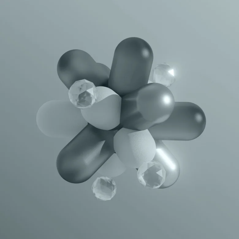 Abstract composition of overlapping, rounded three-dimensional geometric shapes in soft grey and blue tones.
